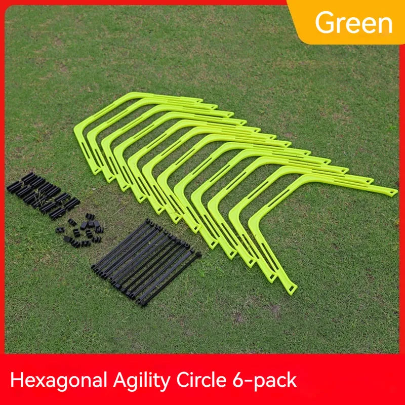 Set of six foldable yellow green and orange hexagon football agility training rings on grass.