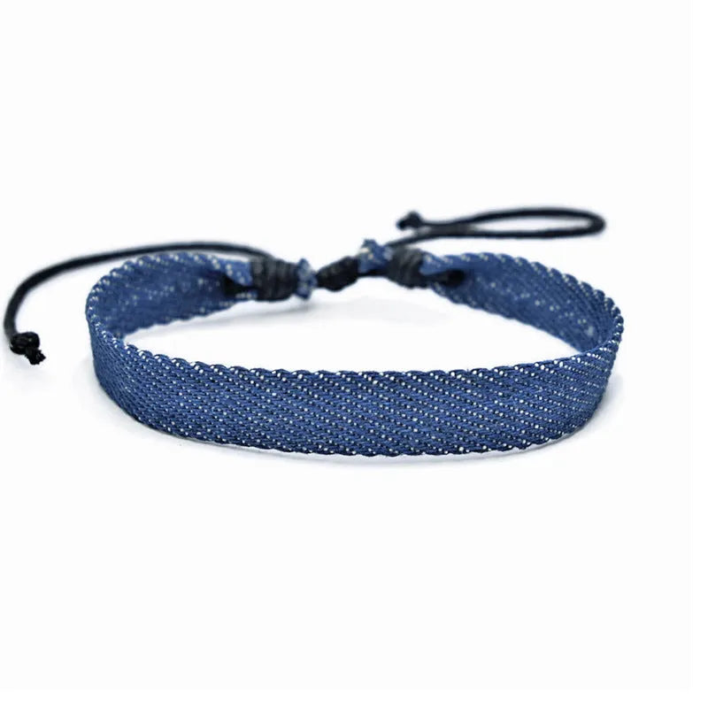 Denim fabric bracelet carrying strap in unisex design with mixed materials and cute styling