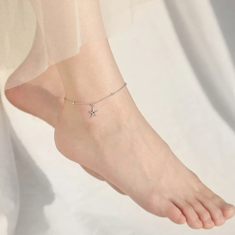Women's sterling silver anklet with starfish charm beads on adjustable chain