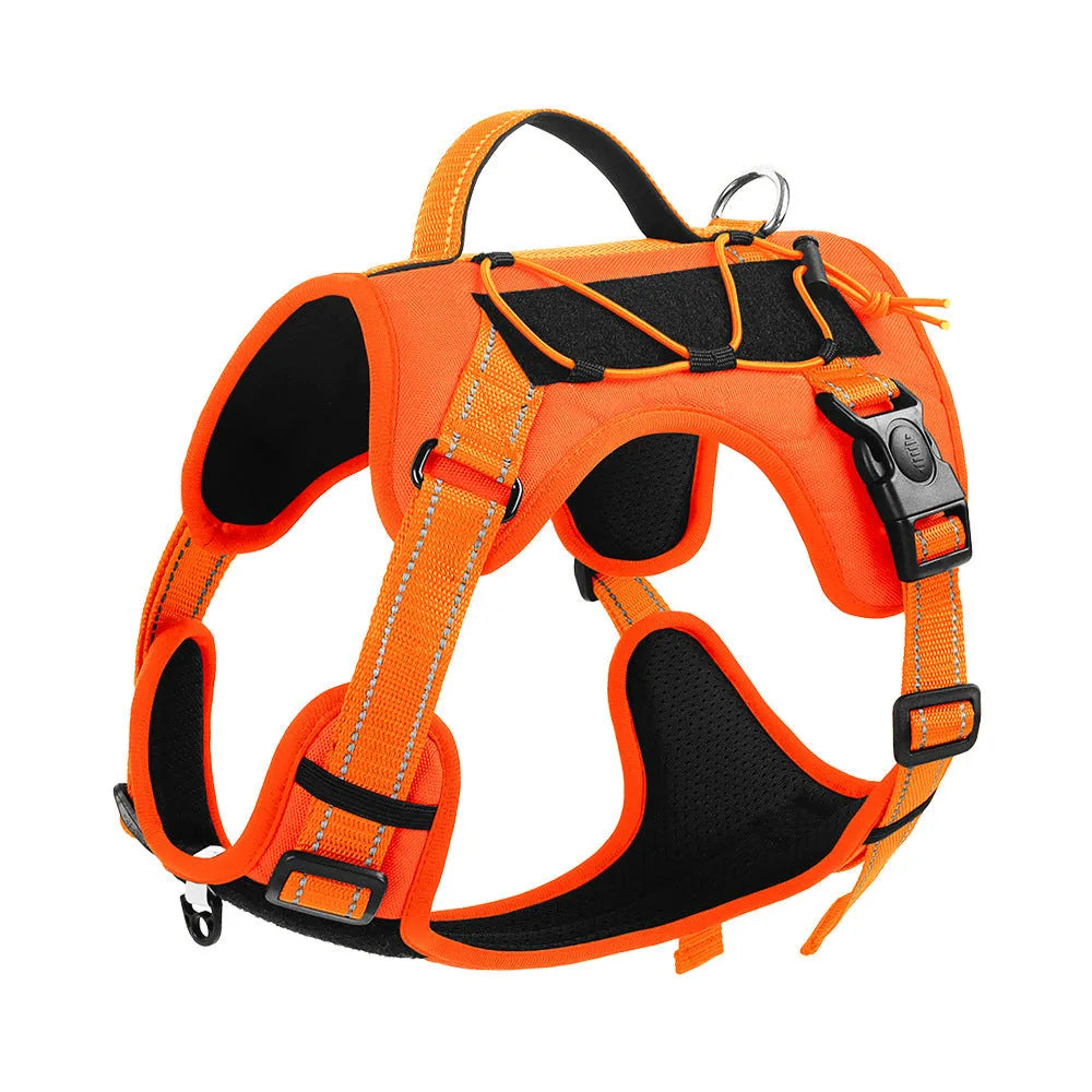 Reflective orange dog harness with black hand holding rope and explosion-proof breast strap.