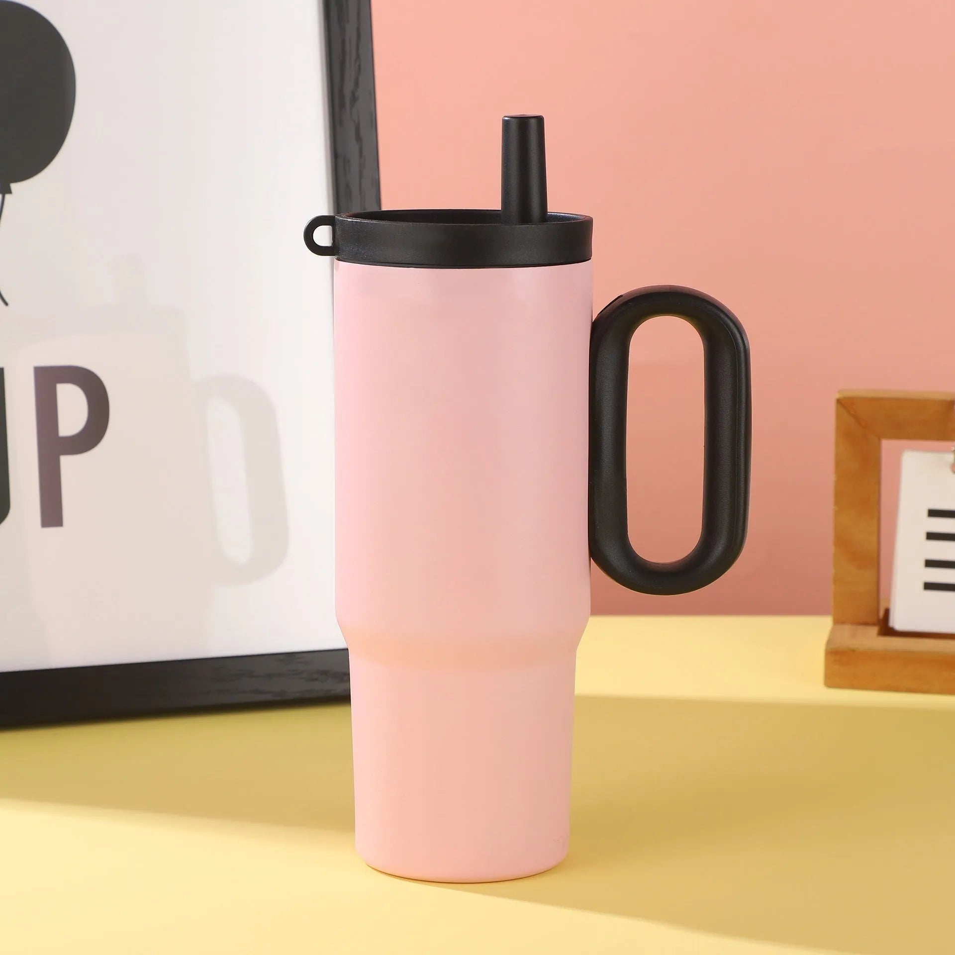 Large stainless steel insulated straw cup with handle in multiple colour options.