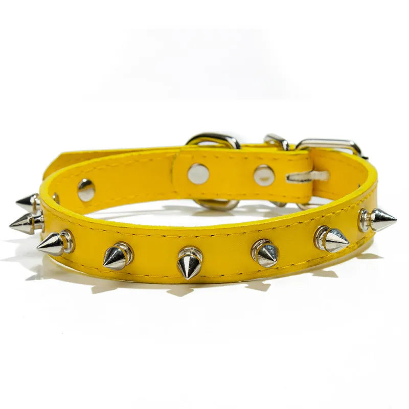 A studded dog collar made of black PU leather with metal studs and an alloy buckle