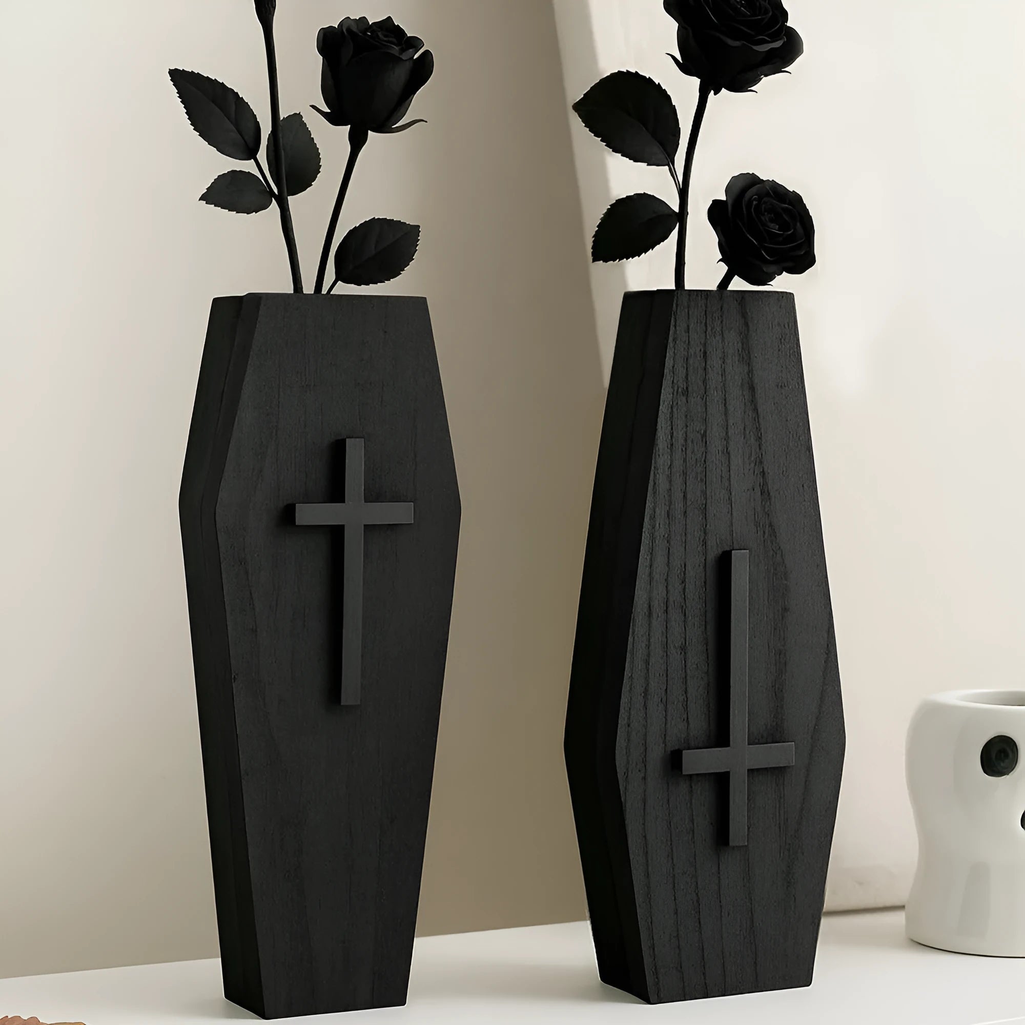 Black wooden cross-shaped wall shelf decoration measuring 27cm by 9cm