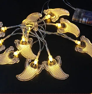 Halloween LED string lights with pumpkin, ghost, and bat pendants in multi-colour light mode