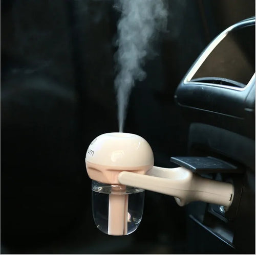 Compact blue car humidifier with 180-degree rotation for vehicle air freshening and humidification