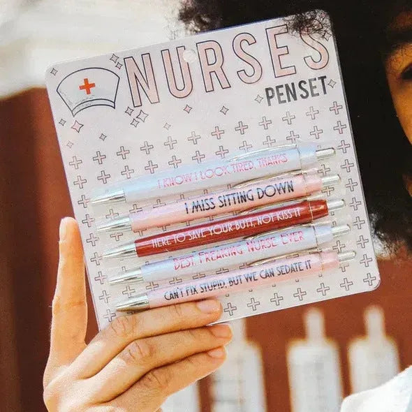 Set of five retractable ballpoint pens with funny nurse-themed graphics and copywriting.