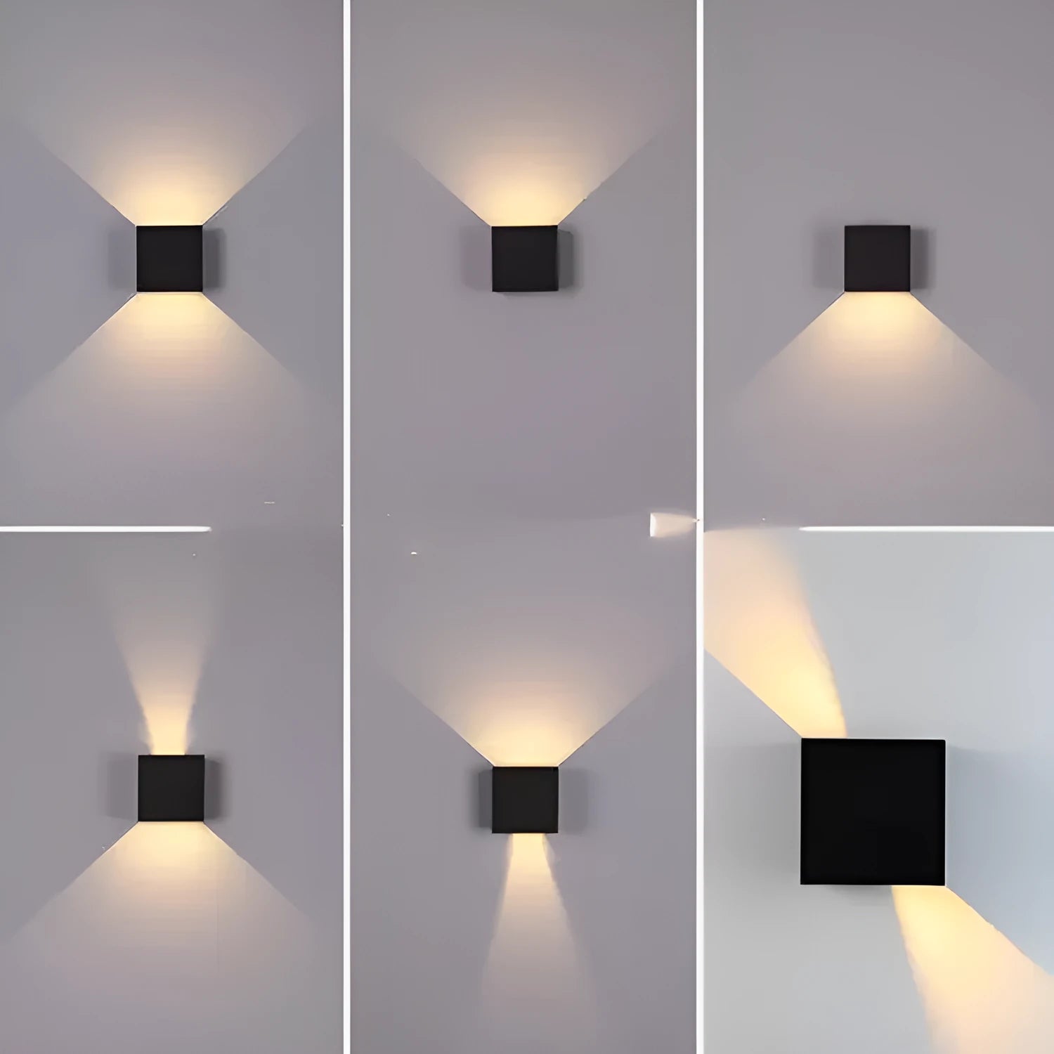 Compact black aluminium cube LED wall lamp mounted on a white wall.