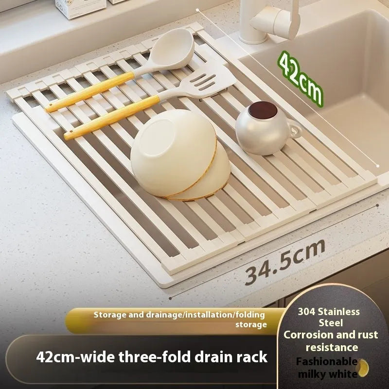 Milky white foldable stainless steel kitchen draining rack for dishes on a countertop