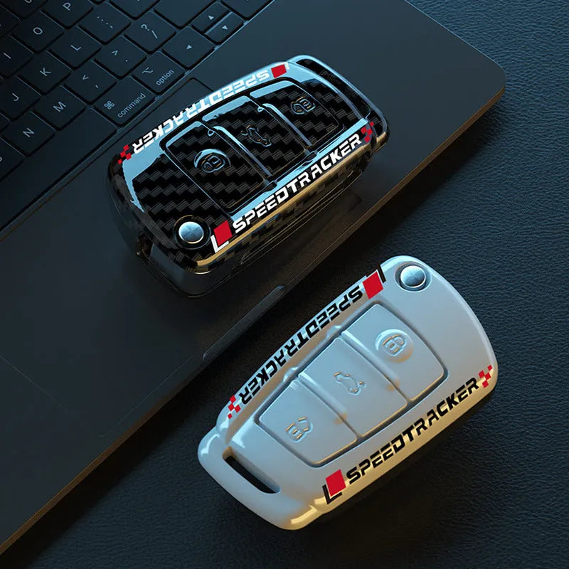 Carbon fibre style car key cover with mirrored finish in carbon pattern and white colour options