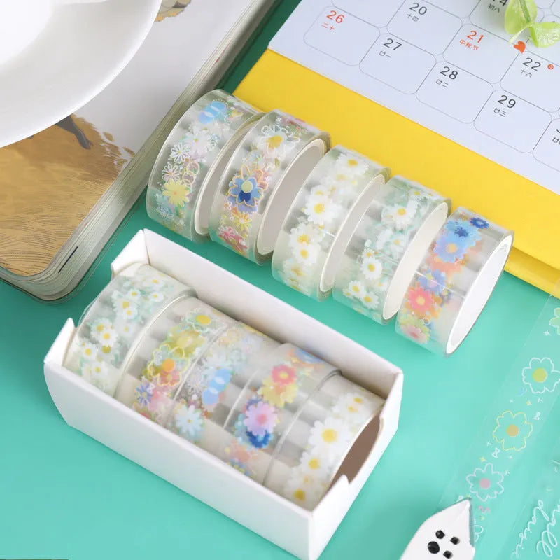 Transparent adhesive tape with midsummer daisy cartoon design on 5 rolls showing 1.5cm width