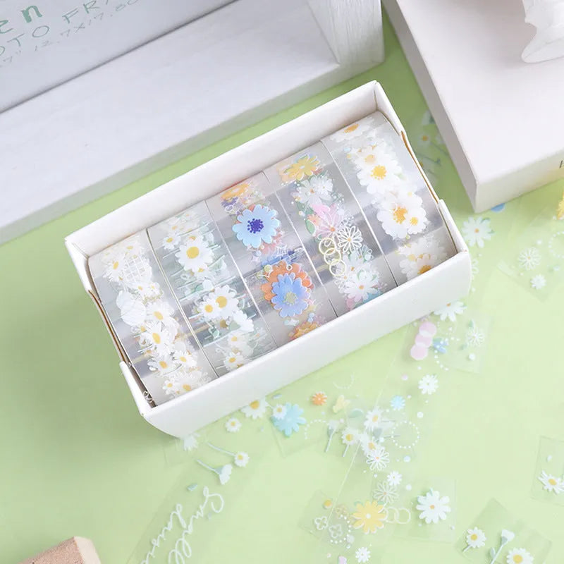 Transparent adhesive tape with midsummer daisy cartoon design on 5 rolls showing 1.5cm width