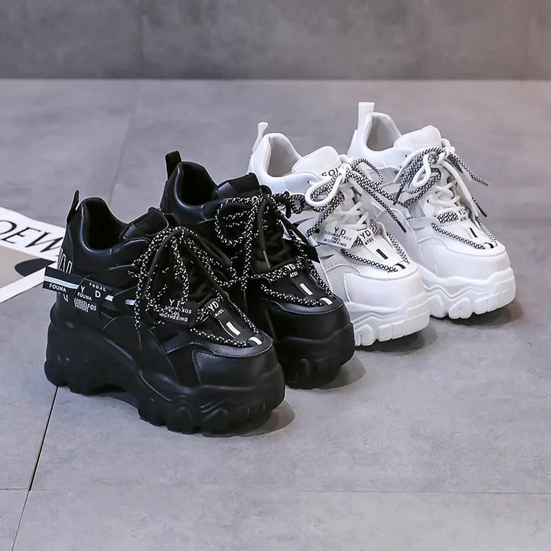 White women's platform tennis shoes with mesh upper and cross strap design
