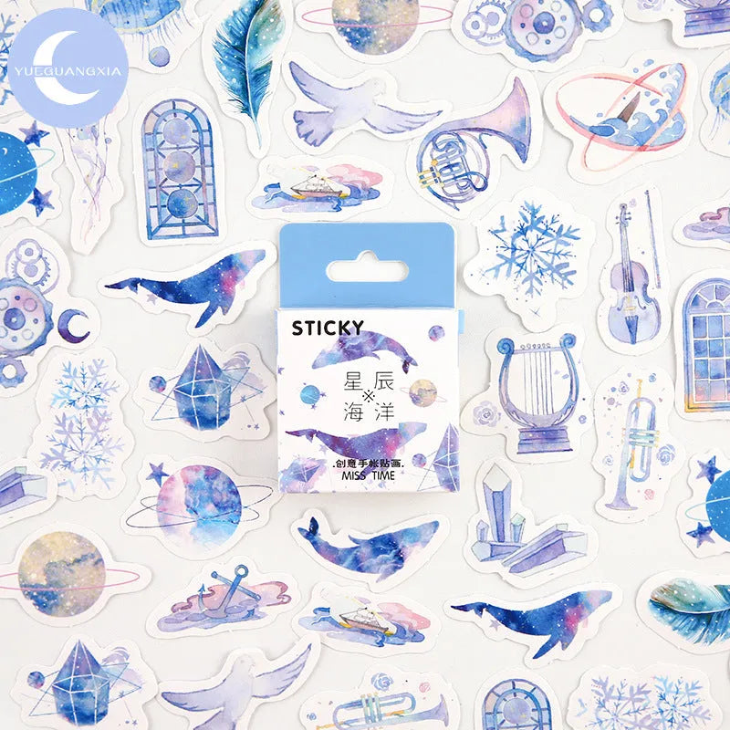 Open box showing 46 small cartoon pattern stickers for journal decoration, themes include Girlhood and Bubble Comic.