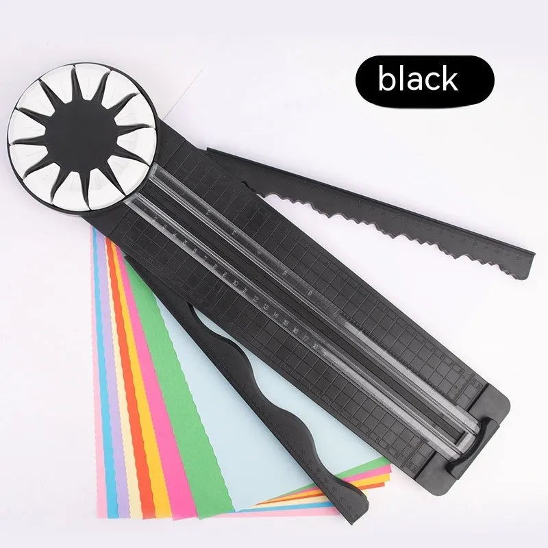 Plastic 12-in-1 paper cutter machine with dotted guide lines in pink colour on white background