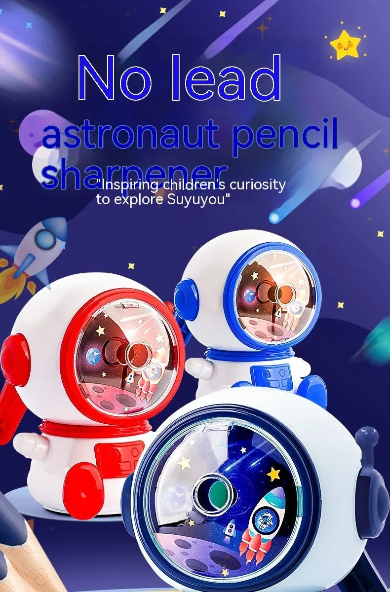 Blue and pink cartoon astronaut model manual pencil sharpener for children on a desk.