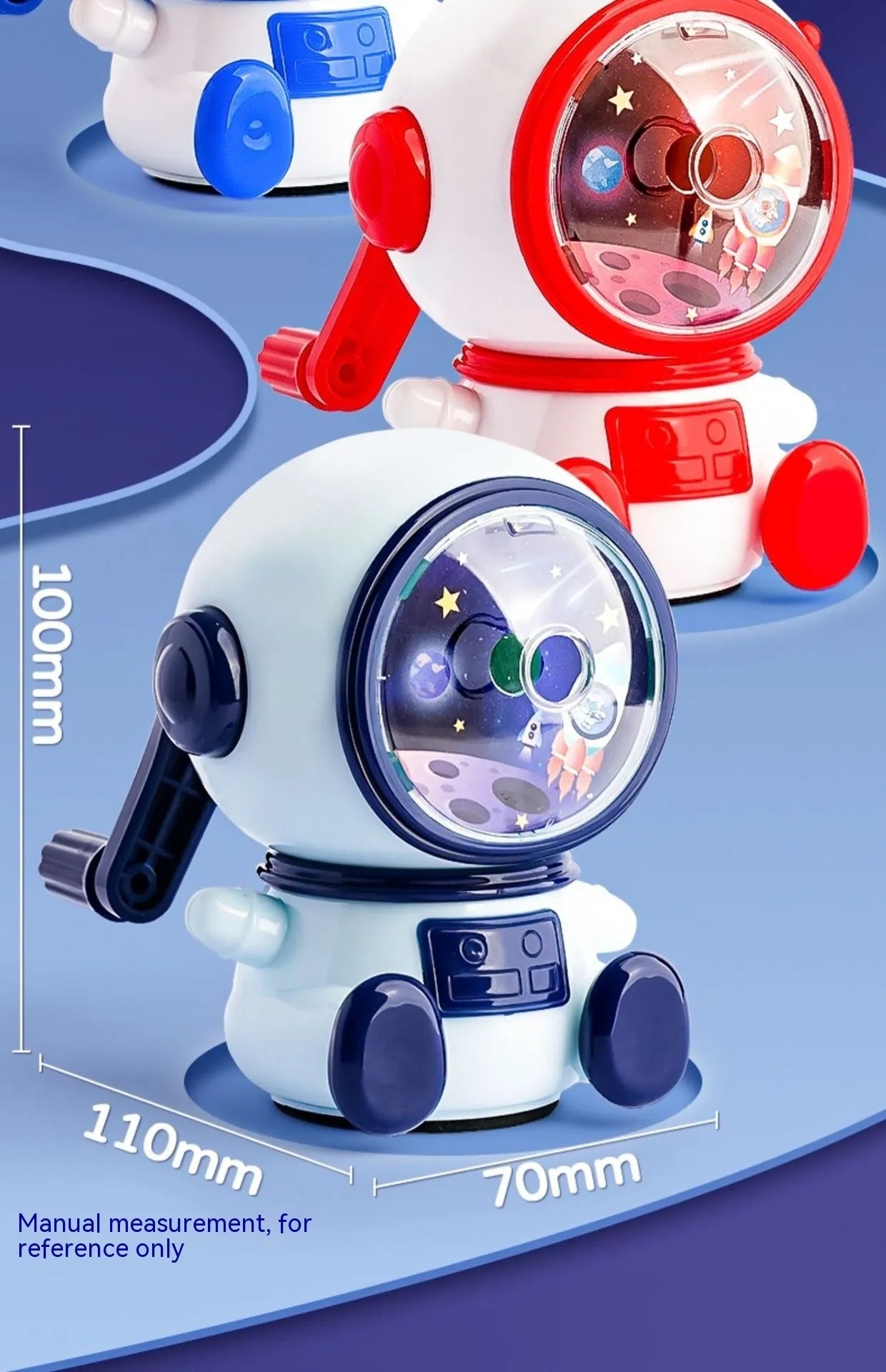 Blue and pink cartoon astronaut model manual pencil sharpener for children on a desk.