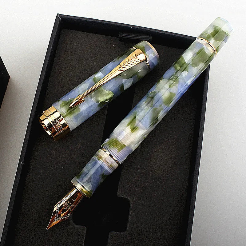 Deep bath green metal fountain pen showing fine, medium and graphic tip options