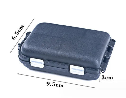 Small black plastic fishing tackle storage box open to show a 10-compartment grid interior.