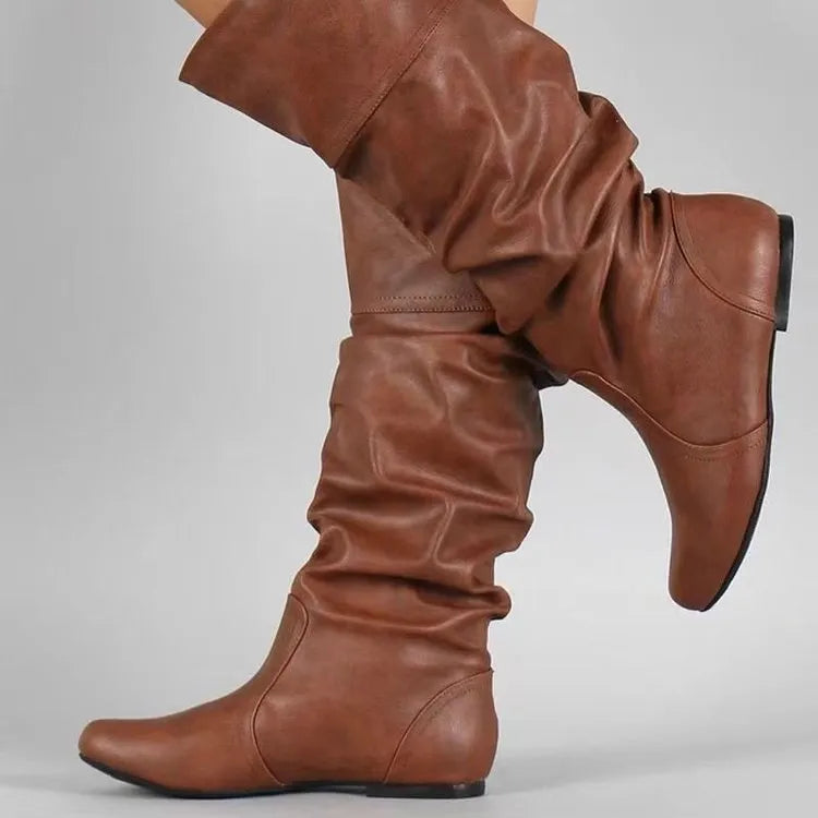 Women's flat ankle boots in artificial PU with round toe and slip-on design