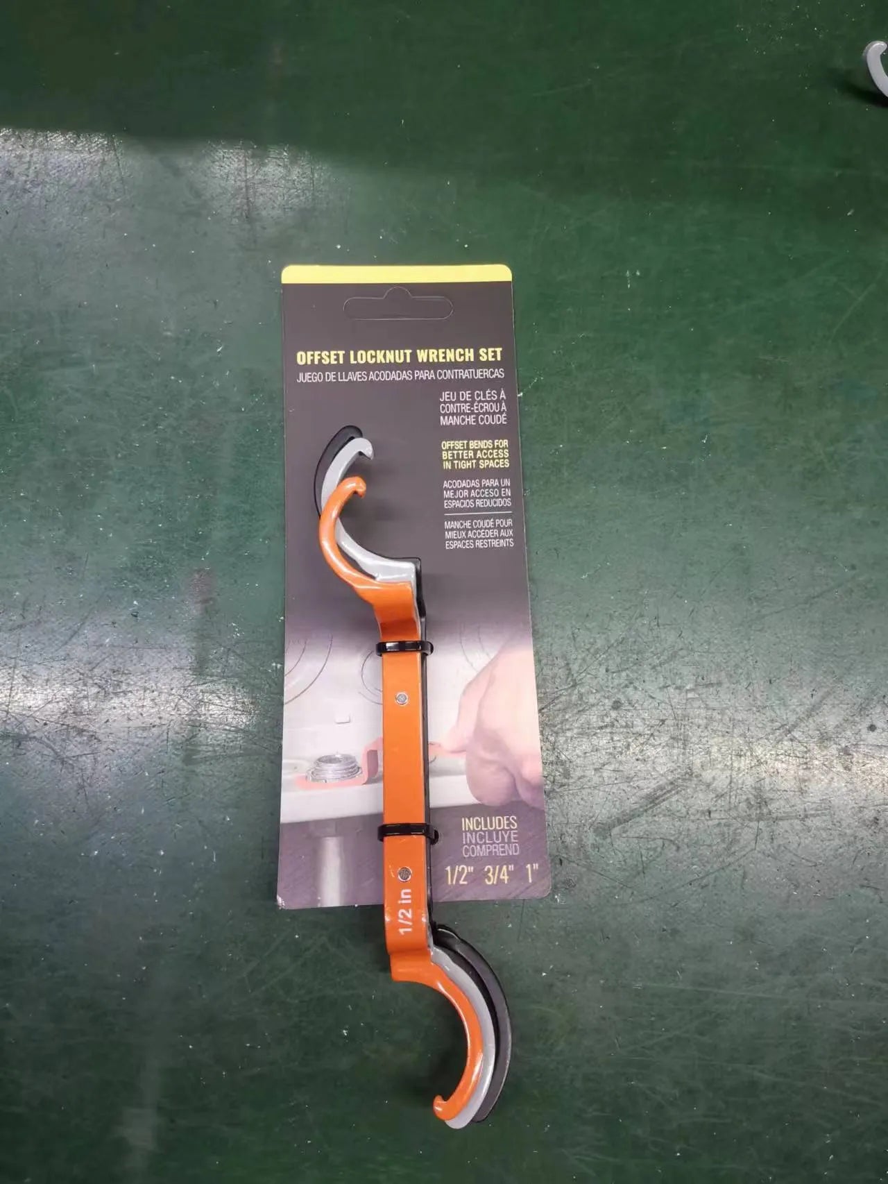 Three magnetic suction wrenches in orange, grey, and black colours showing size differences