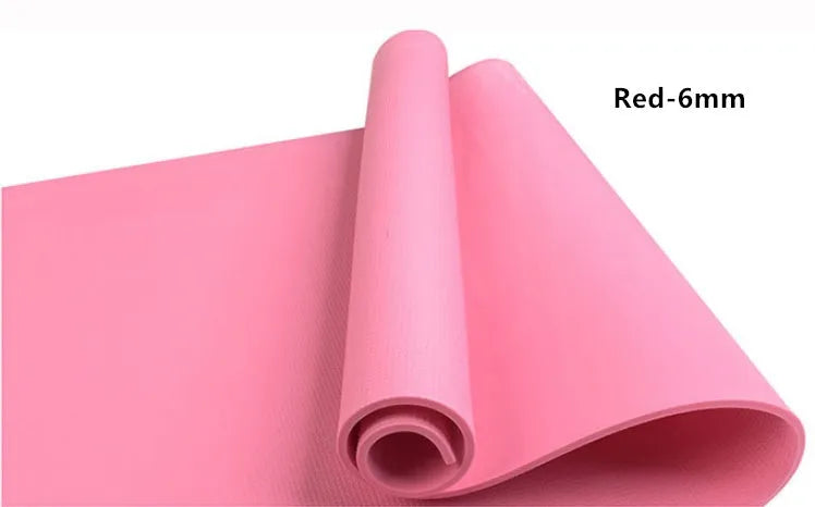 Red EVA yoga mat with textured anti-skid surface, shown rolled and unrolled.