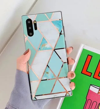 Glossy electroplated marble design TPU back cover case for a Huawei smartphone.