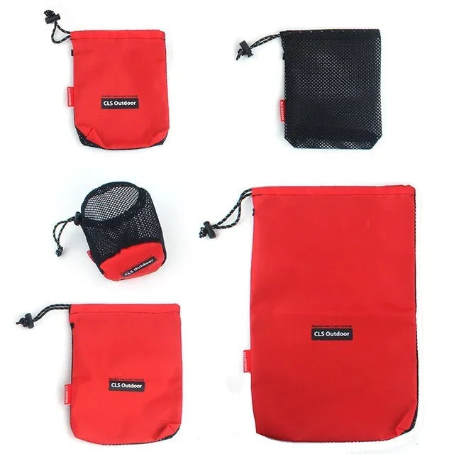 Red five-piece outdoor travel storage bag set with zipper closures and mesh panelling