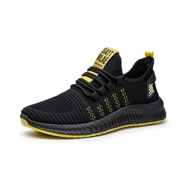 Men's black casual sports shoes with cross-strap detail and Flying Weave textured upper.