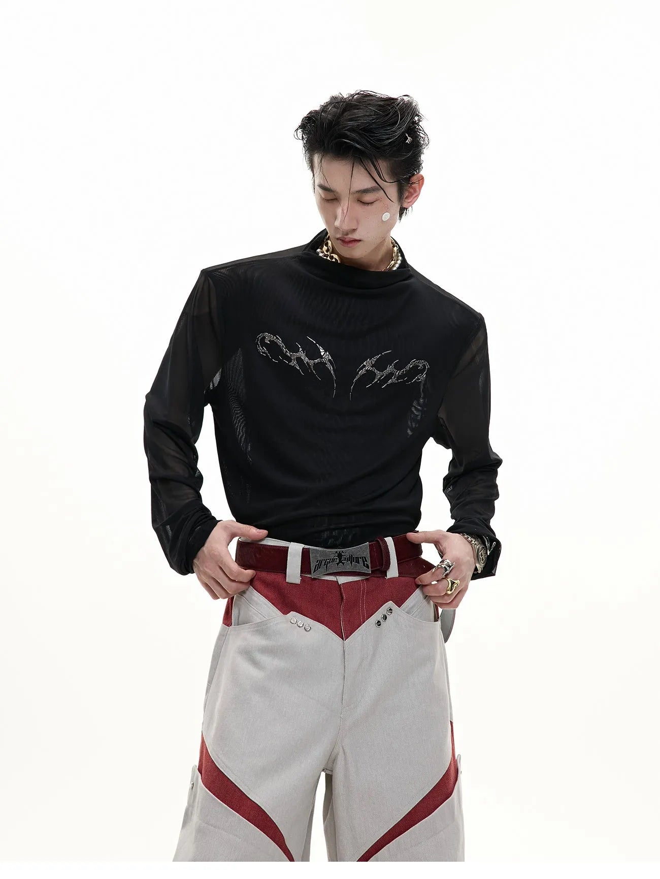 Man's black slim-fit long sleeve mesh shirt for gym wear and training.