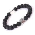 Tigereye Indian Agate stone beaded dog's paw bracelet on wrist, showing geometry shape and round beads.