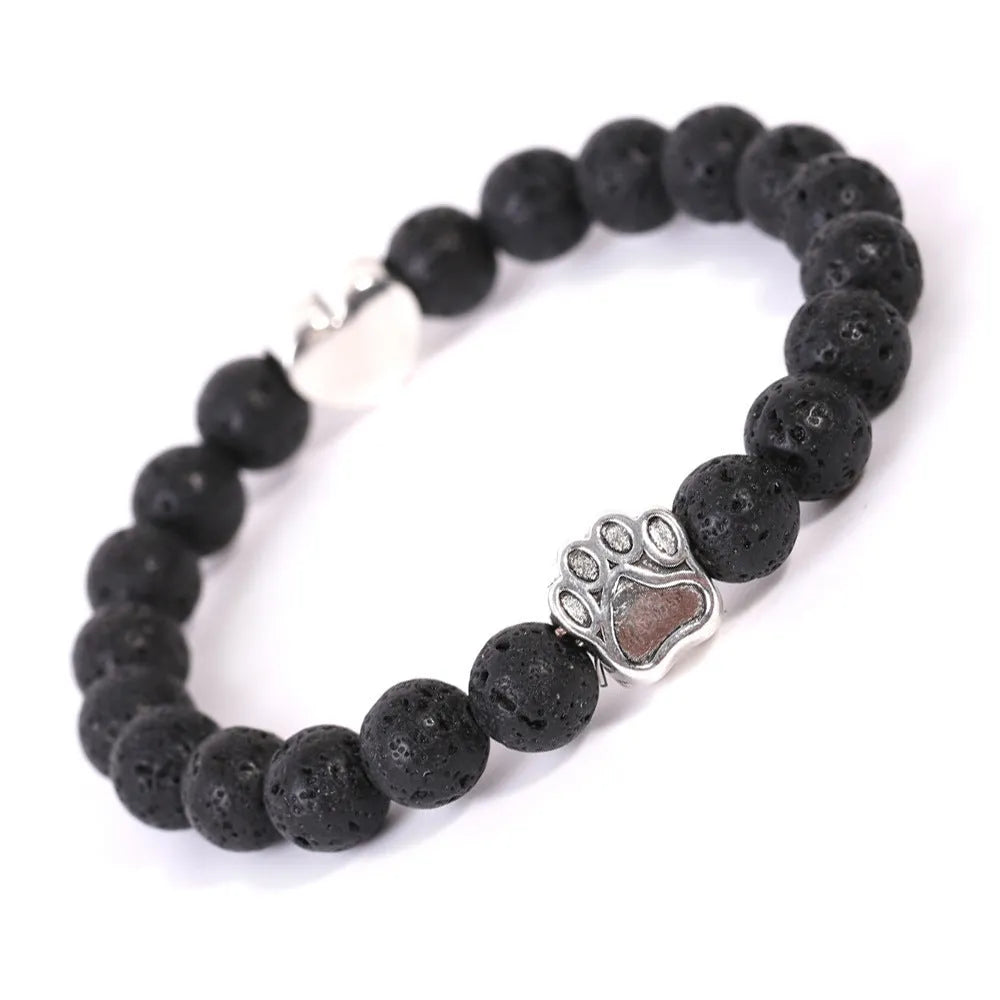 Tigereye Indian Agate stone beaded dog's paw bracelet on wrist, showing geometry shape and round beads.