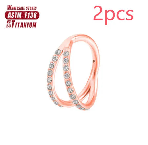 Titanium alloy fork nose ring in silver colour on a plain background, showing its shape and size.