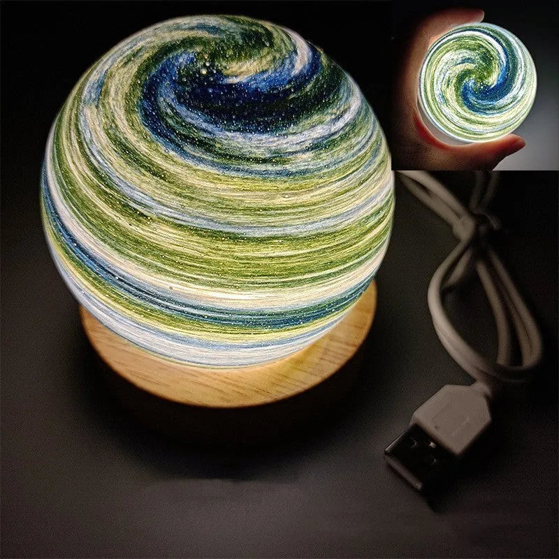 Planet-themed USB plug-in night light with three-colour dimming on a base, showing 80x90mm size.