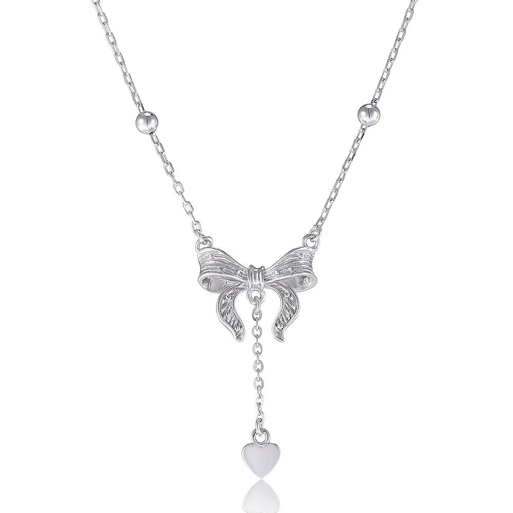 S925 silver butterfly heart necklace on adjustable O-ring chain showing heart pendant with bow and butterfly details