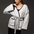 Loose mid-length knitted cardigan with lace-up front closure in cotton imitation cashmere fabric