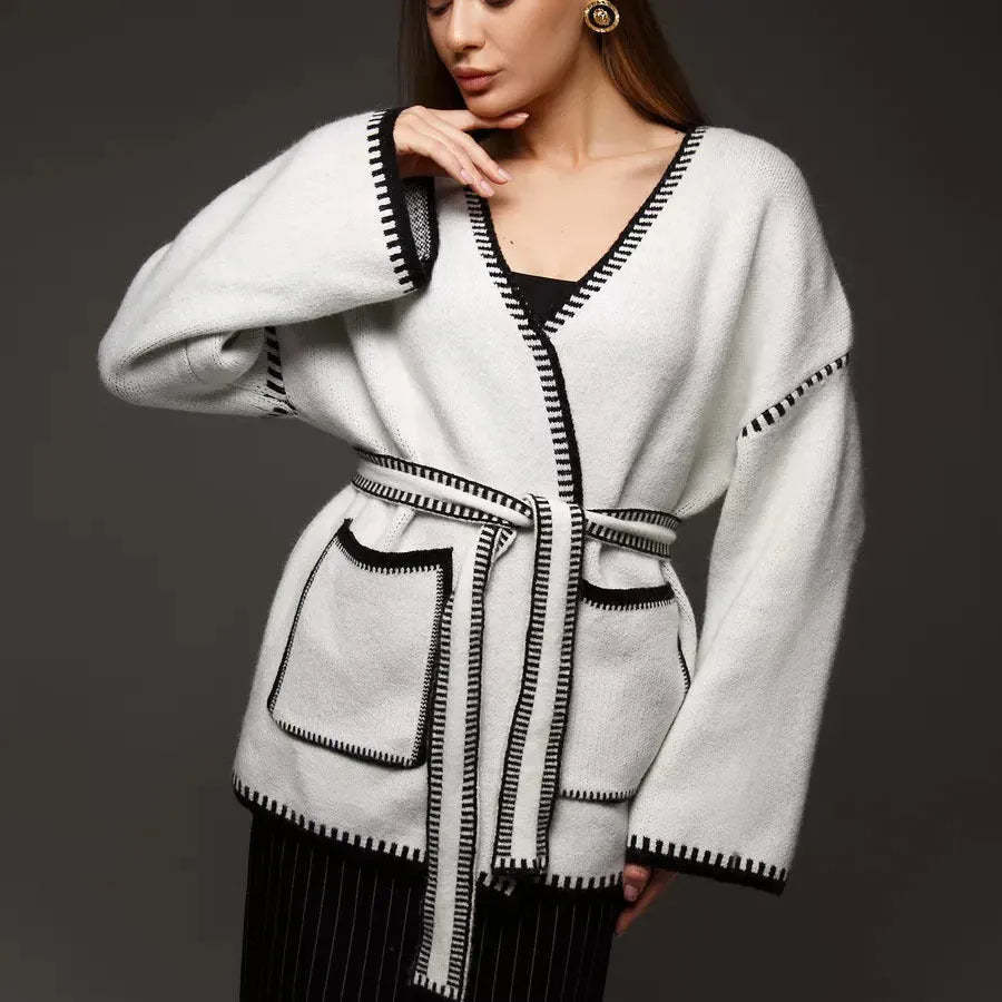 Loose mid-length knitted cardigan with lace-up front closure in cotton imitation cashmere fabric