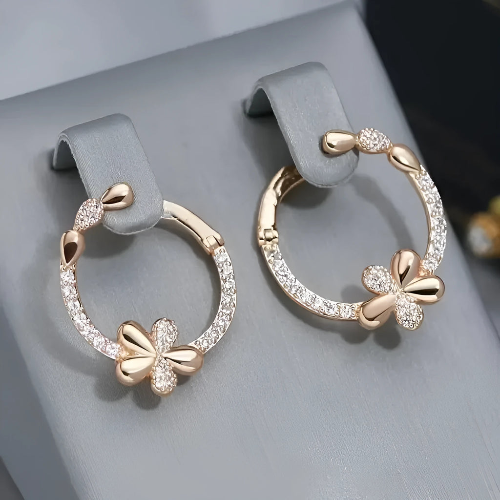 A pair of women's round copper hoop earrings with an electroplated finish in colour EK13286-FD-01.