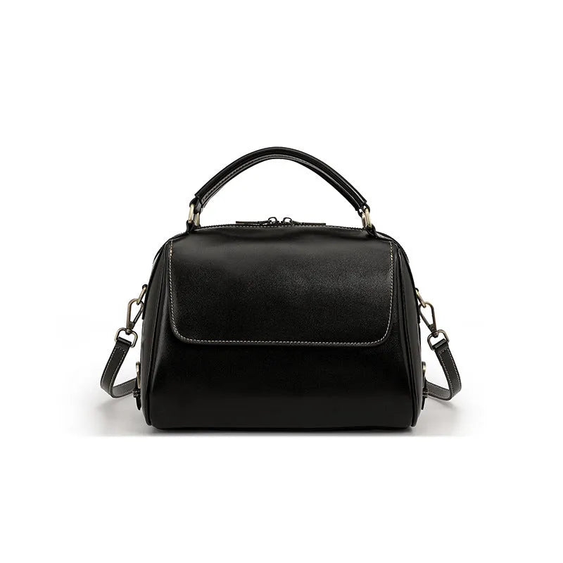 Genuine leather crossbody tote bag in a cross square shape with double straps and internal organiser pockets.