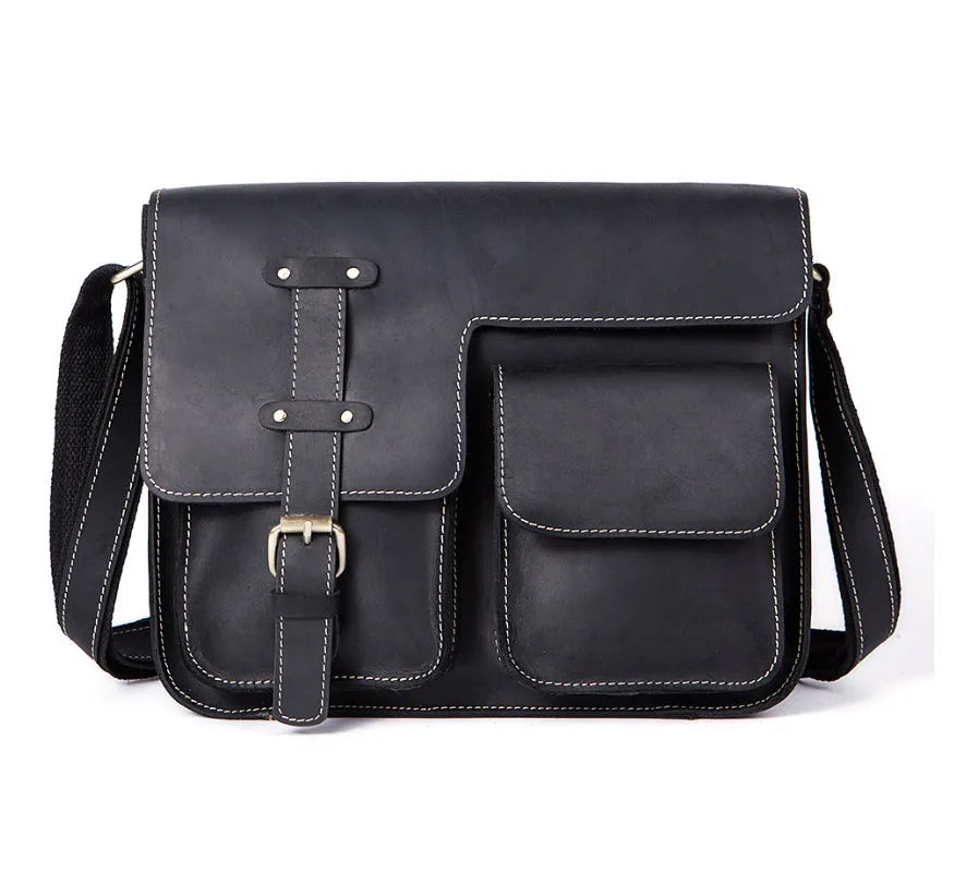 Brown leather vintage messenger bag with adjustable strap and buckle closure