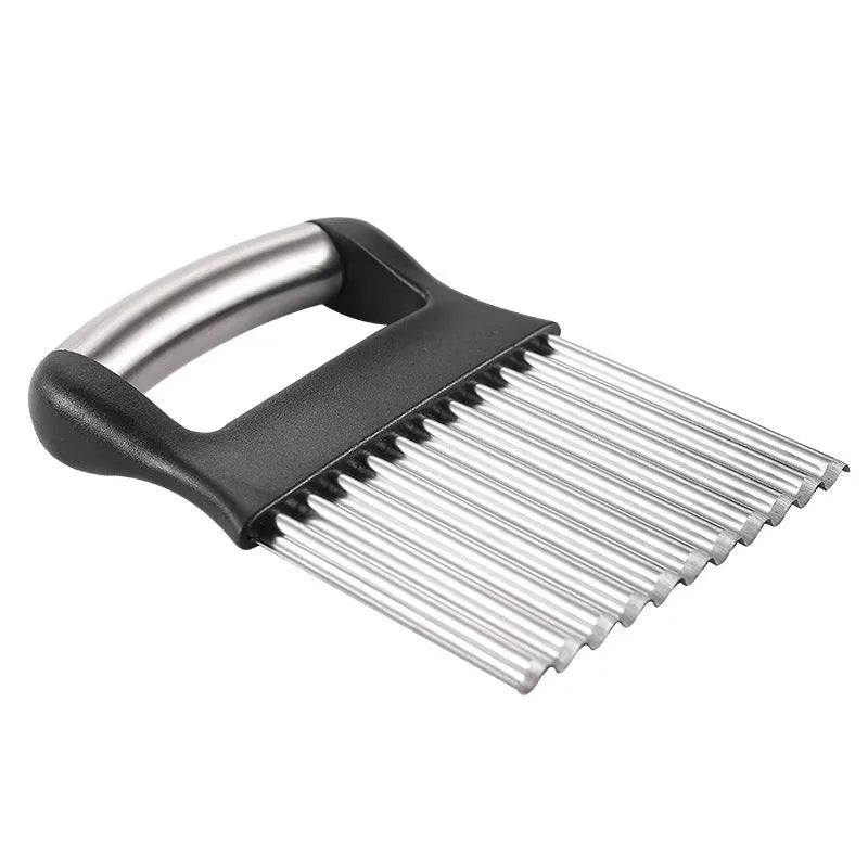 Stainless steel potato wave knife with serrated blade on a kitchen counter.