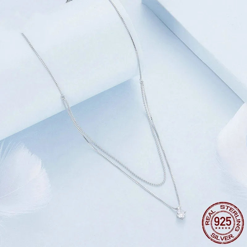 Silver colour double-layer necklace with pearl chain and pendant made from 925 sterling silver