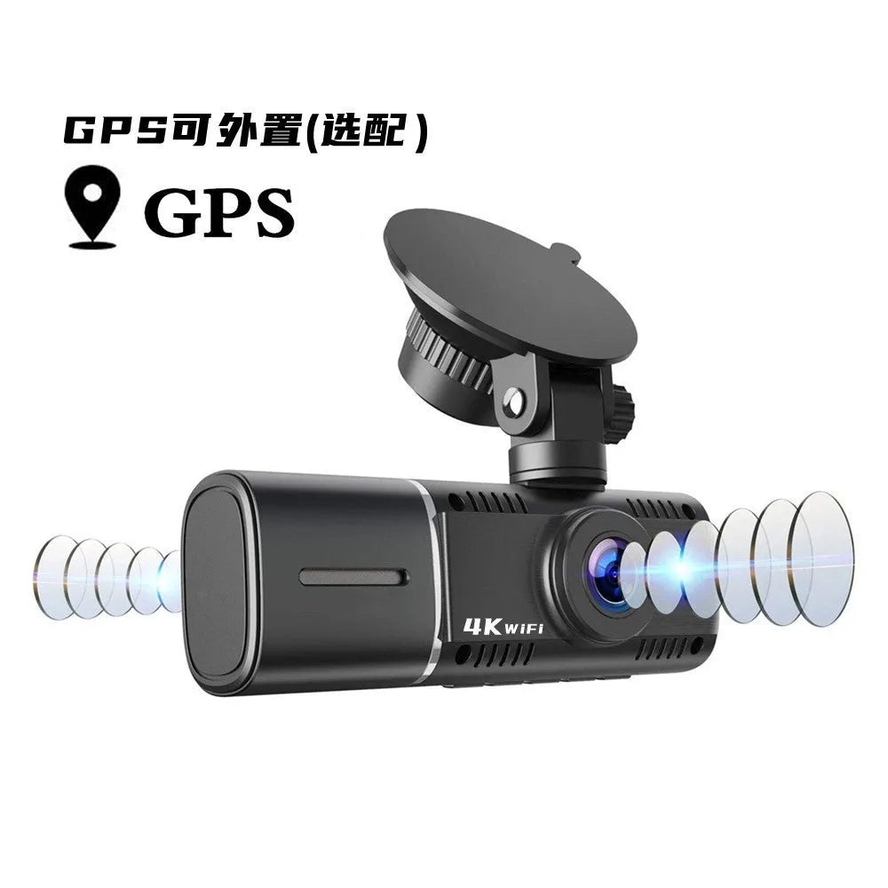 Black dash cam with 1.5-inch screen mounted on car windscreen showing dual camera recording.
