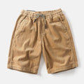 Men's khaki straight-leg cargo shorts with cargo pockets on a white background