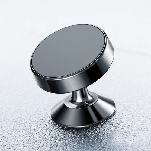 Magnetic car phone holder with aluminium alloy cradle shown in black, mounted on a car air vent.