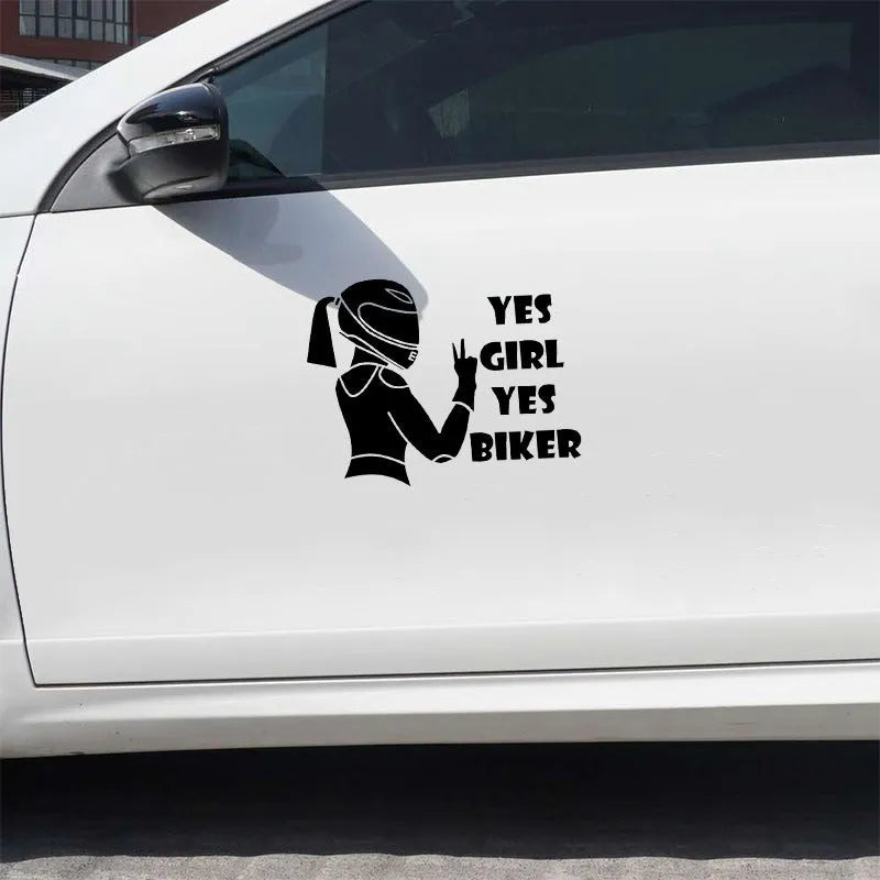 Black and white cartoon girl rider character car window sticker measuring 16cm by 15cm