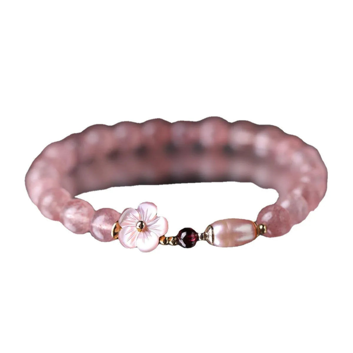 Women's casual crystal bracelet with a strawberry quartz peach blossom flower charm.