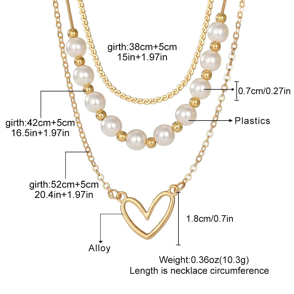Vintage gold necklace with heart pendant on pearl chain, adjustable 41-50cm length