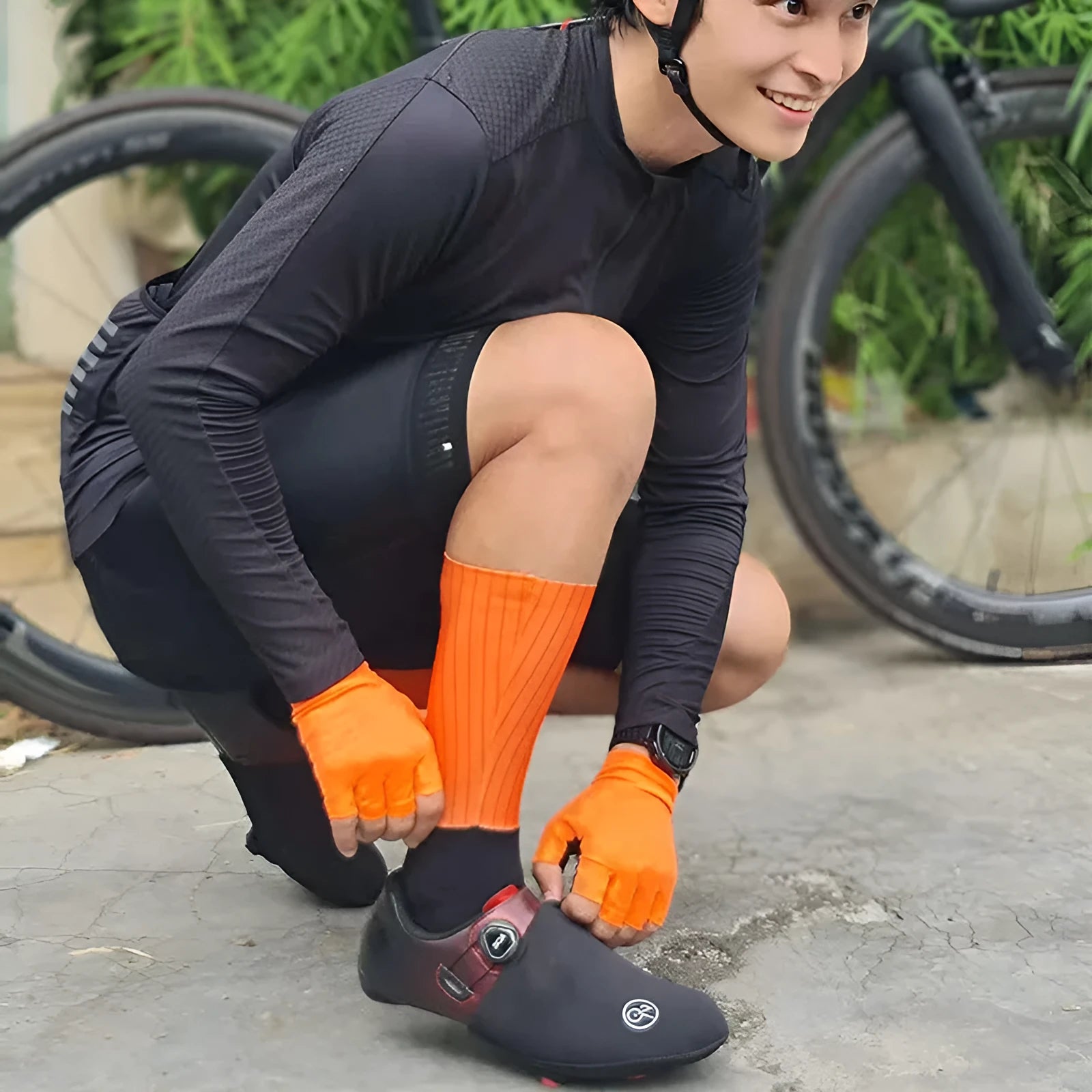 A pair of breathable athletic cycling socks in a chemical fibre blend, shown in one of six available colours.