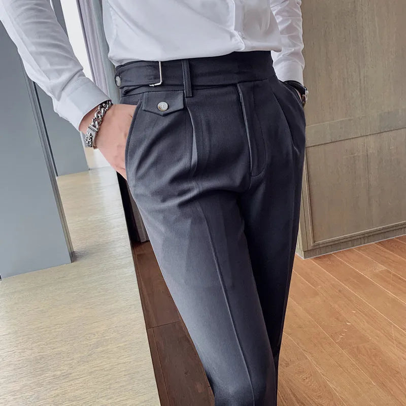 Men's straight leg casual trousers in solid colours including black and grey on a hanger.