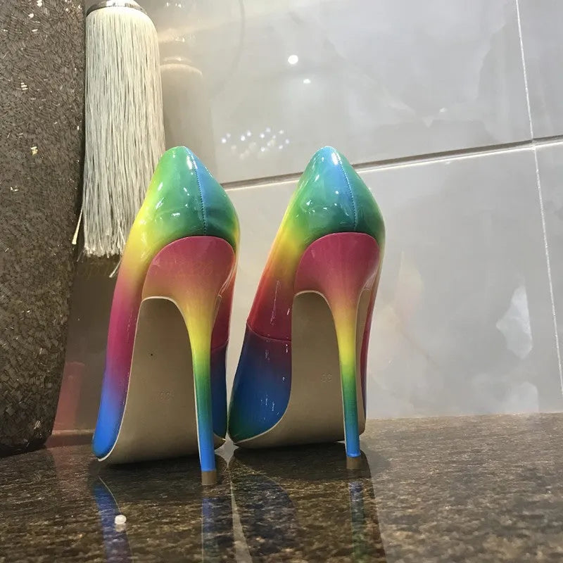 Rainbow patent leather women's ultra-high heel shoes with pointed toe and thin stiletto heel.